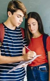 schoolkids-writing-something-down